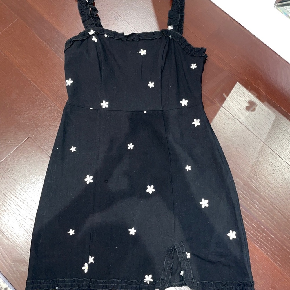 Kendall and Kylie black dress with sunflowers